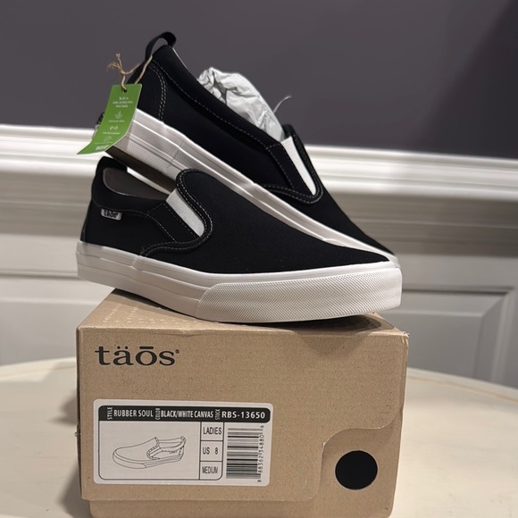 Taos Footwear Shoes - Taos Footwear Black and White Slip-On Sneakers Sleek Design